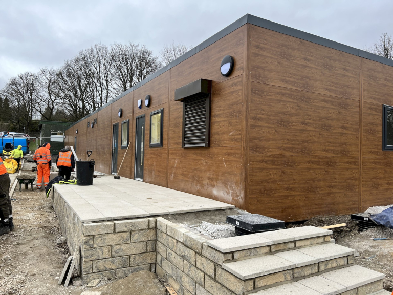 9 bay modular school changing rooms being fitted in the school grounds